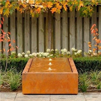 Mesa de água iluminada em aço corten