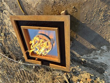 Fogo a gás e fonte de água